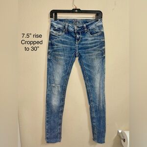 Women’s buckle skinny jeans W25